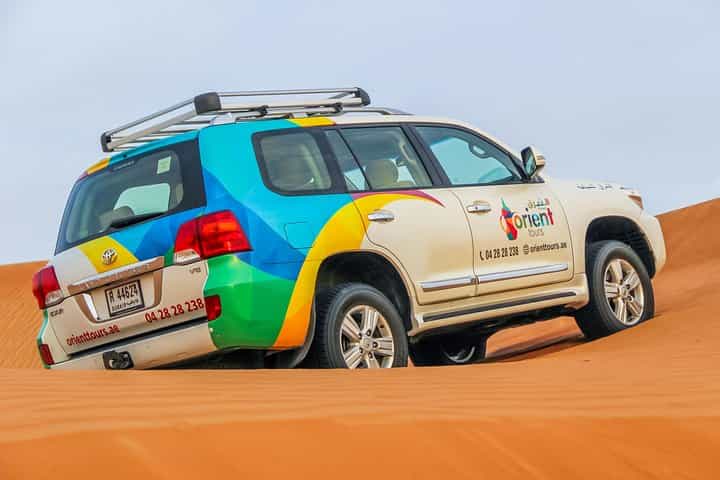 Morning Dubai Desert Safari with Camel Ride & Sand boarding 