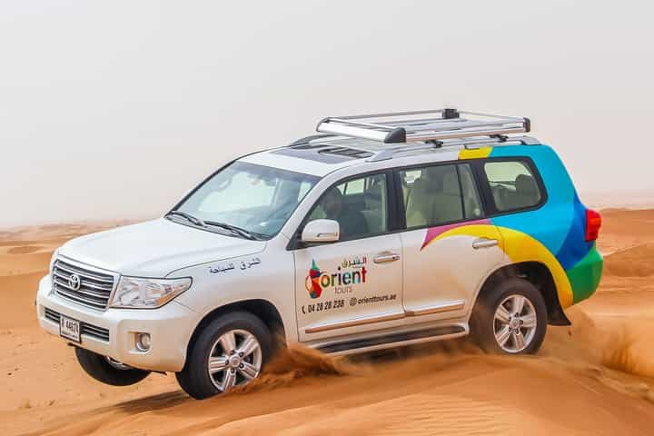 Premium Dubai Desert Safari with BBQ Dinner in the Red Dunes