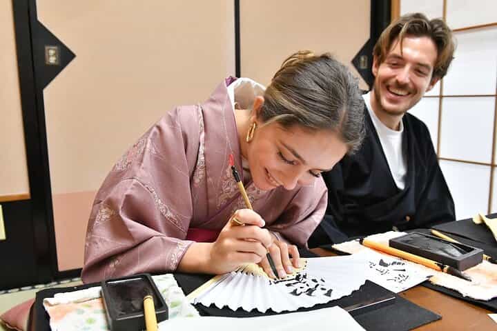 Learning Zen of Japanese Calligraphy in kimono near Osaka Castle