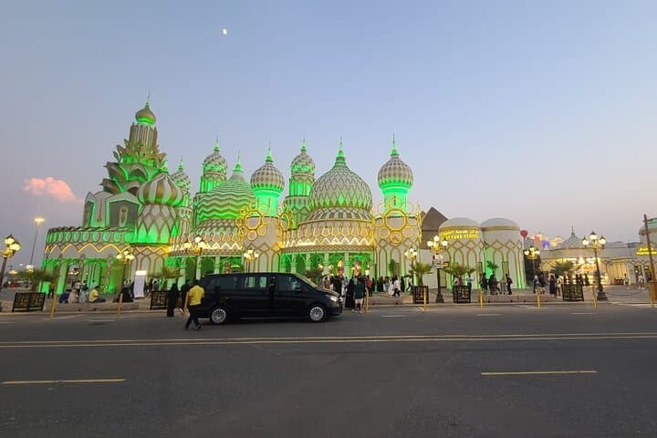 Global Village two way transfer by van in Dubai