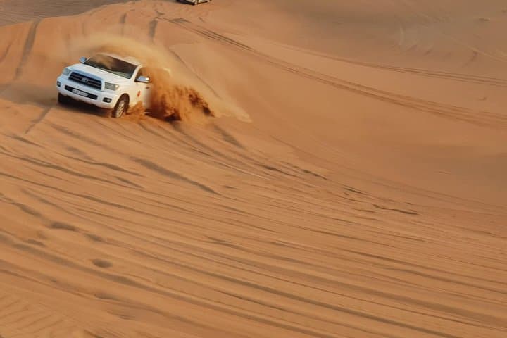 Dubai: Desert Safari, Quad Bike, Camel Ride, and Buffet Dinner