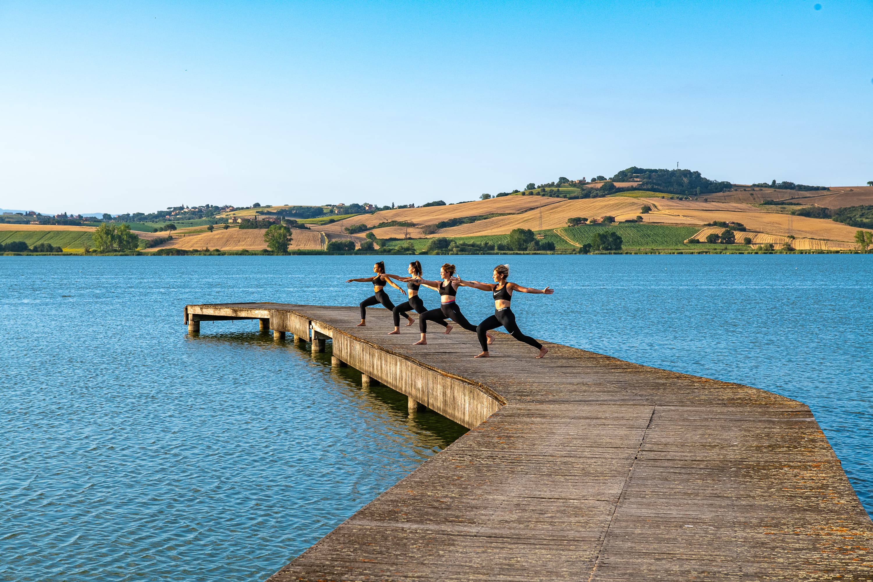 Yoga lesson on the shores of the Etruscan lake with picnic