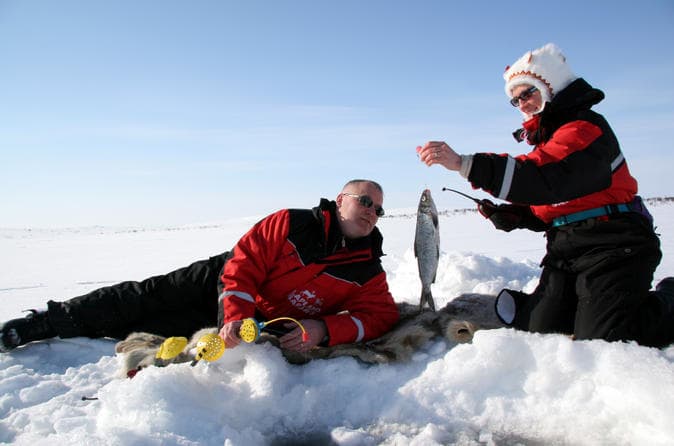 Snowmobile safari with ice-fishing adventure in Levi