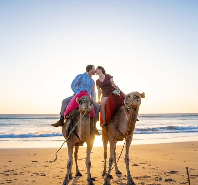 Camel riding with BBQ and sunset