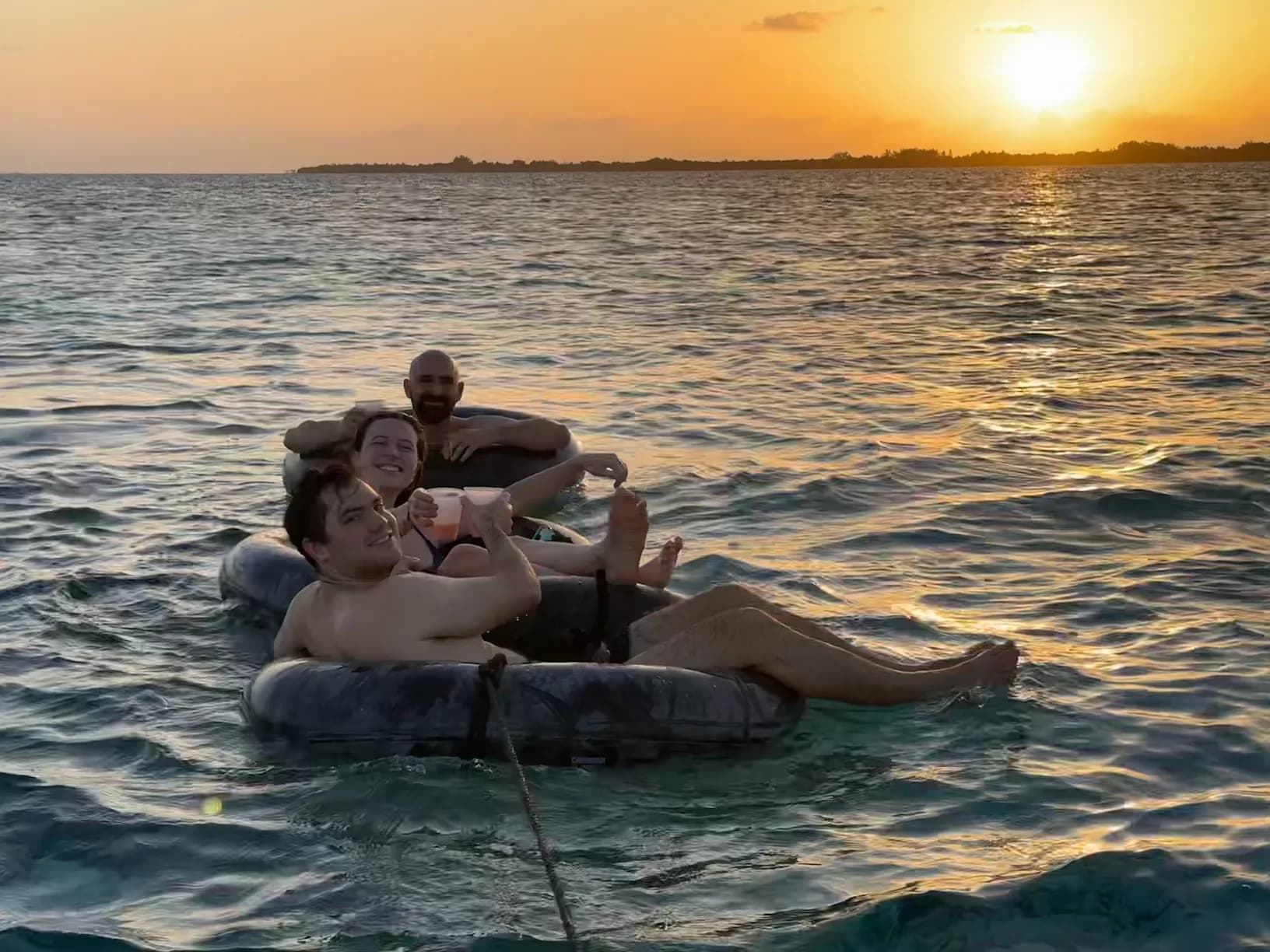 sun set tubing around the island