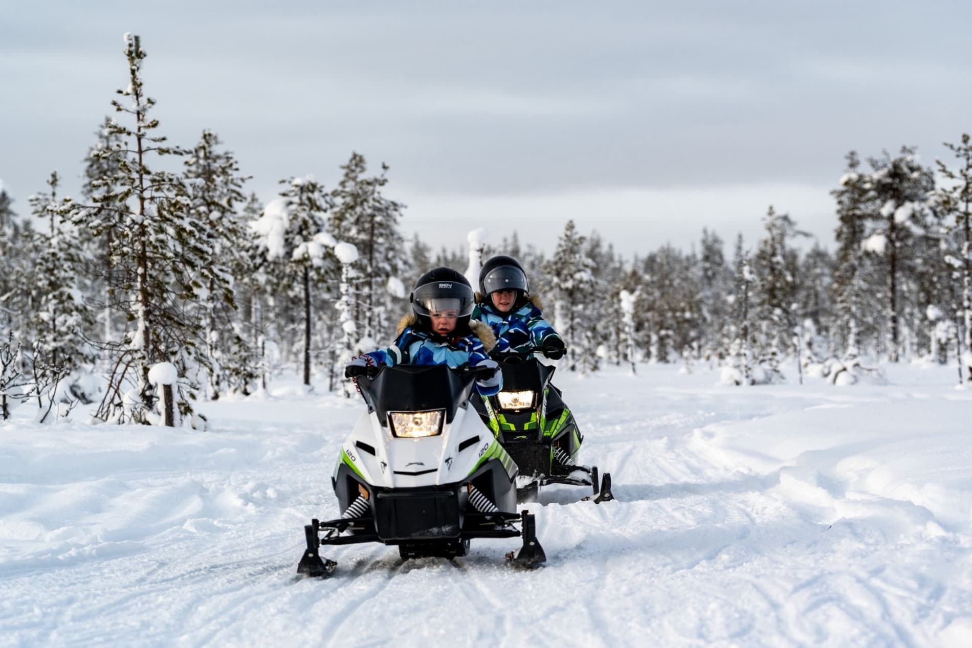 Family snowmobile safari - with mini snowmobiles for kids, Levi