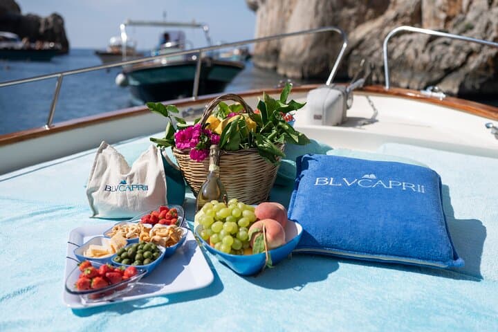 Private Gozzo Boat Tour of Capri with Swim and Local Delicacies