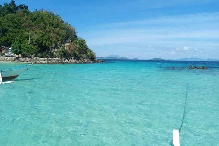 Portbarton island hopping tour with transport fr puerto princesa