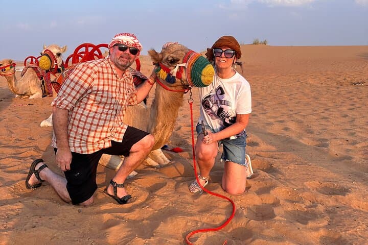 Exclusive Desert Safari Camel Ride Sandboard & Buffet BBQ Dinner