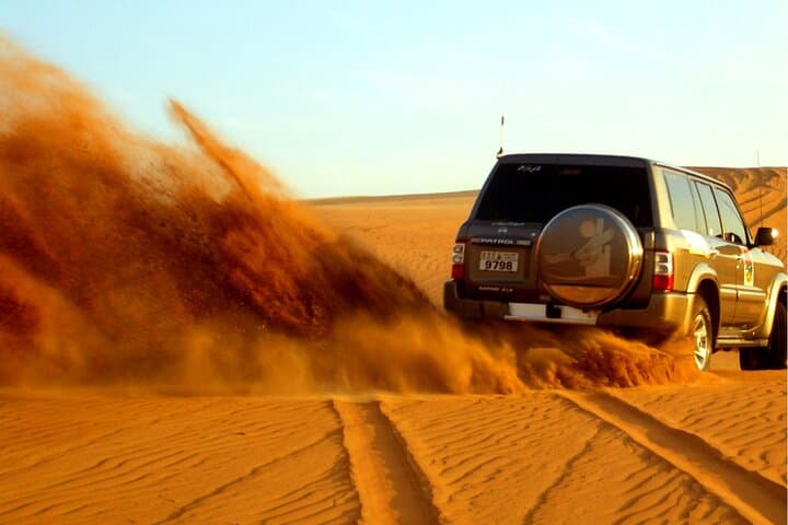 Dubai Desert Safari & BBQ Dinner with Live Belly Dance,Fire Show, Tanura Show 