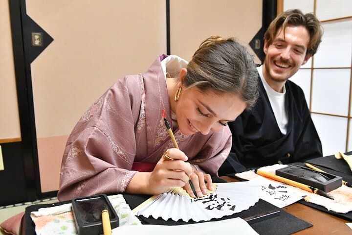 Learning Zen of Japanese Calligraphy in kimono near Osaka Castle