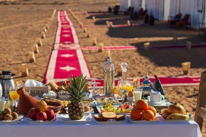 Merzouga: Overnight in Luxury Desert Camp with Camel Ride, meals & sandboarding