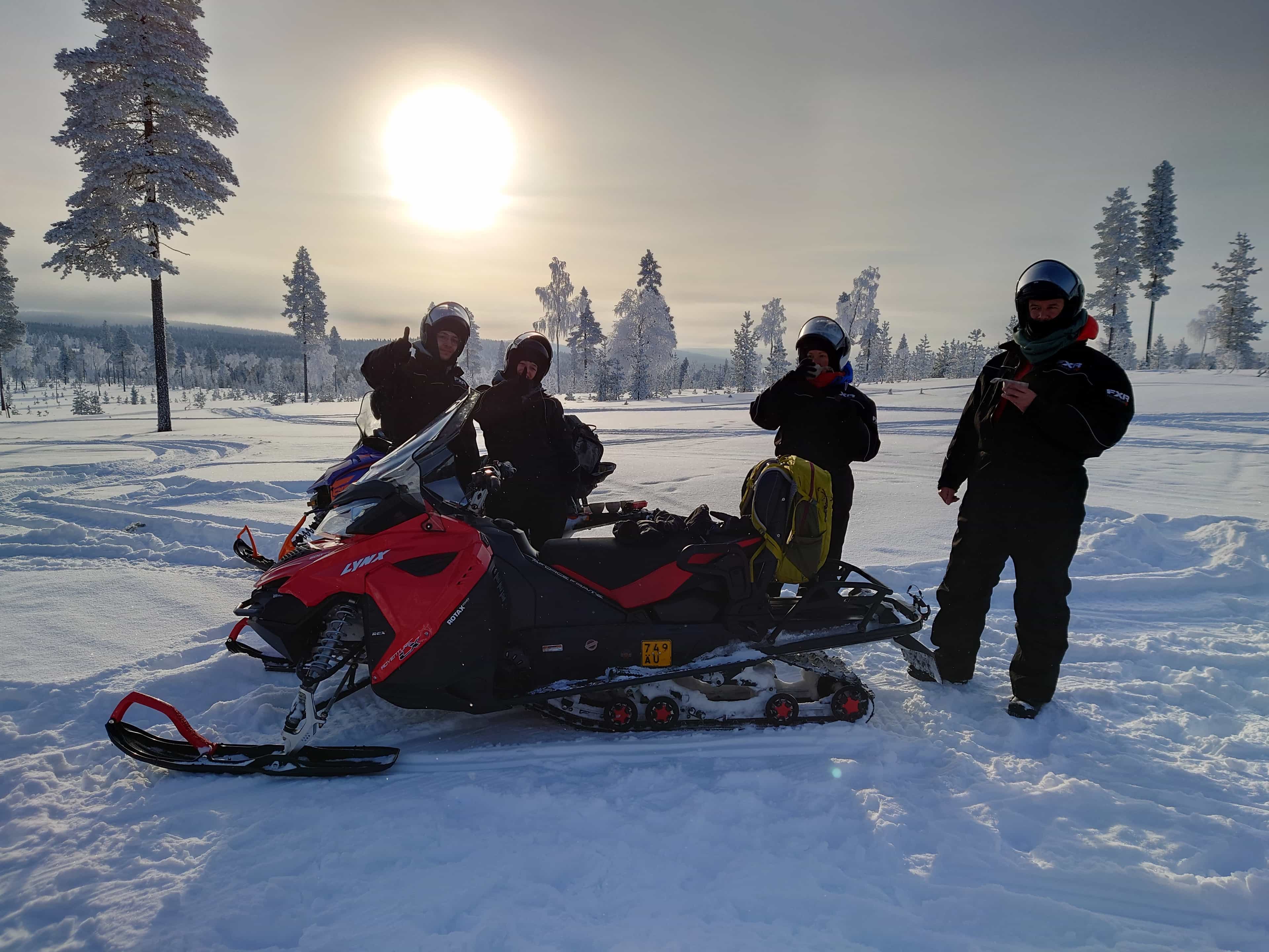 THE COUPLE SAFARI BY SNOWMOBILE