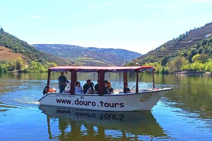 50-minute Boat Tour with Guide and Glass of Port wine offered