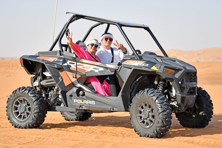 Premium Desert Safari Dune Buggy Camel Ride Sandboard & BBQDinner Premium Desert Safari Dune Buggy Camel Ride Sandboard & BBQDinner