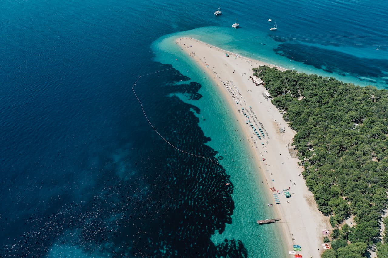 Split in 1 Day for Couples - Swim and sunbathe at Zlatni rat (Golden Horn) — one of the world’s iconic pebble beaches Split in 1 Day for Couples - Swim and sunbathe at Zlatni rat (Golden Horn) — one of the world’s iconic pebble beaches
