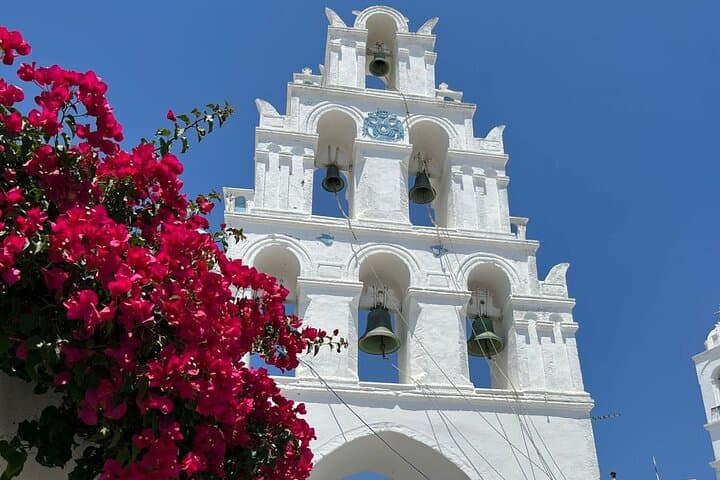 Fira in 1 Day for Couples - Megalochori village square with bougainvillaea and church bells Fira in 1 Day for Couples - Megalochori village square with bougainvillaea and church bells